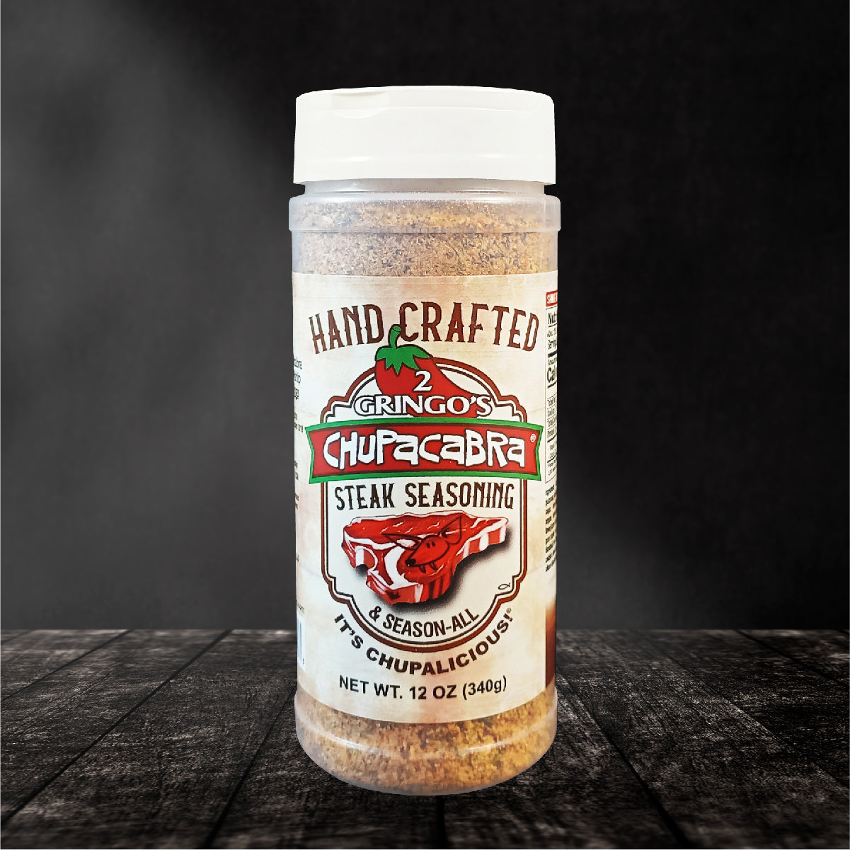 Chupacabra Steak Seasoning 25 oz bottle with a savory spice blend for grilling.