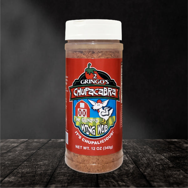 Chupacabra Wing Wub 12 Oz bottle featuring a vibrant label and a rich blend of spices for enhancing flavors.