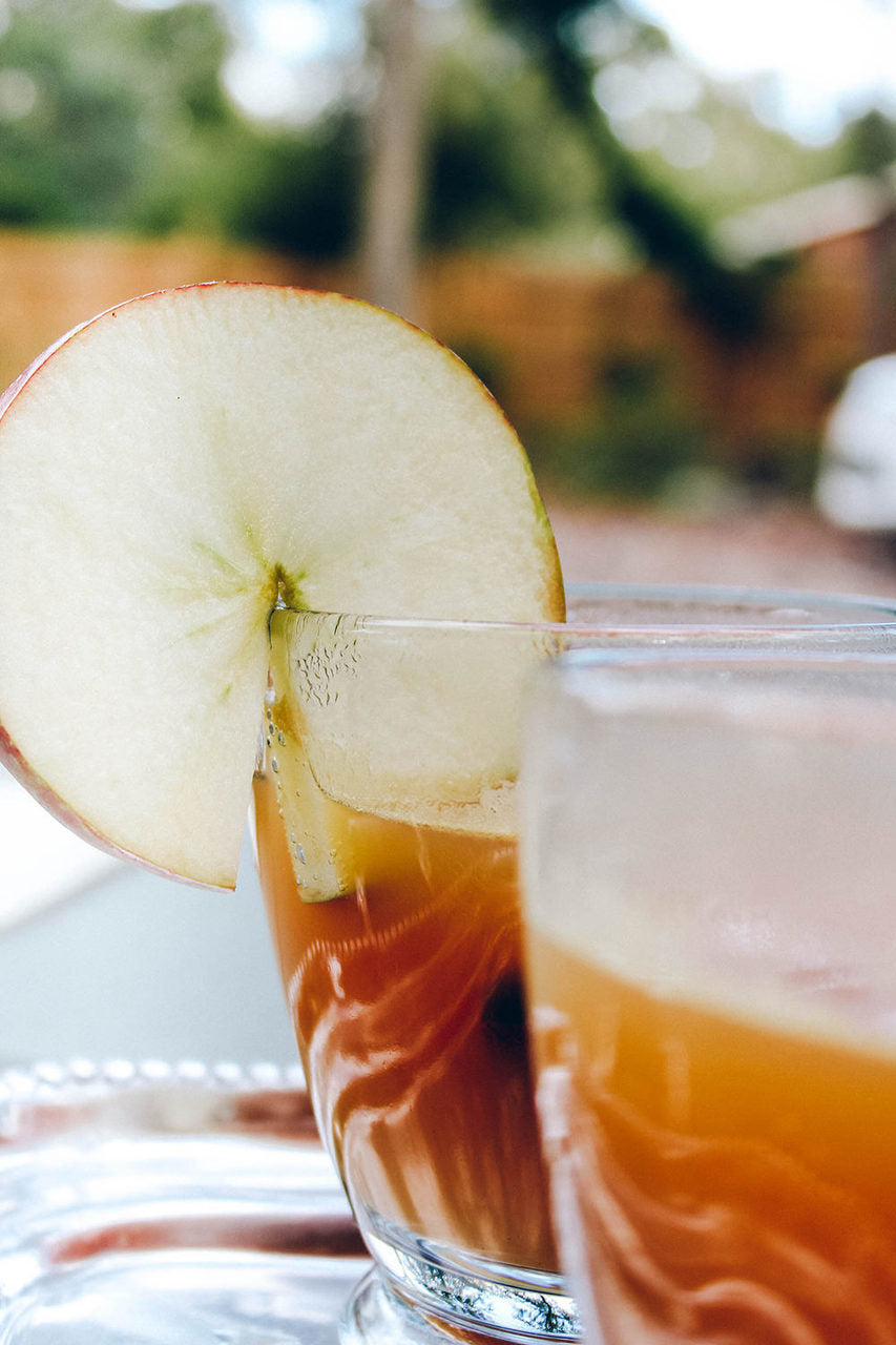 A 1-gallon package of Cider Spices Wassail featuring cinnamon sticks, ginger, and nutmeg, perfect for brewing traditional mulled cider.