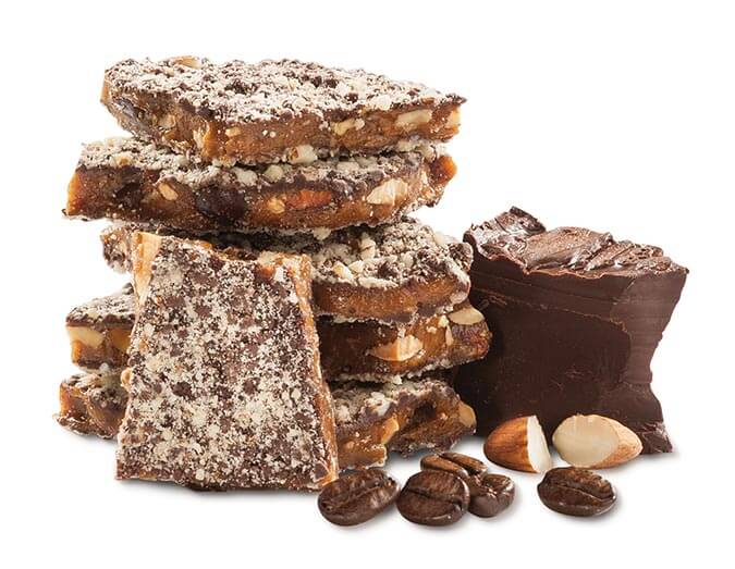 A close-up of Dave’s Sweet Tooth Coffee Toffee showcasing its rich texture and coffee bean pieces.