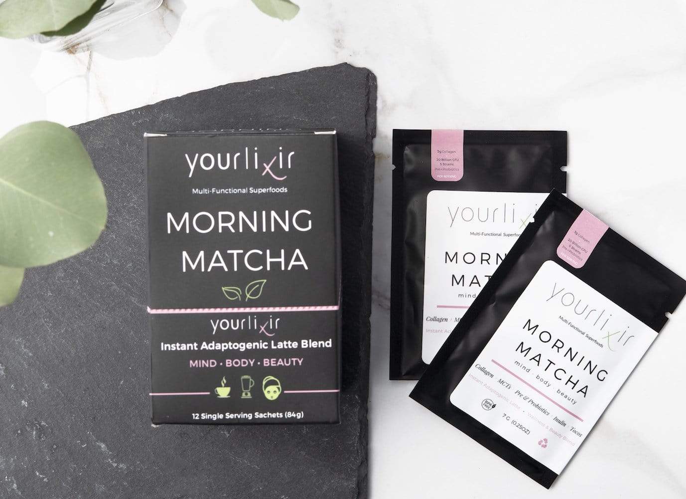 Collagen + Probiotic Matcha Sachets in a box, showcasing the convenient packaging and vibrant matcha color.