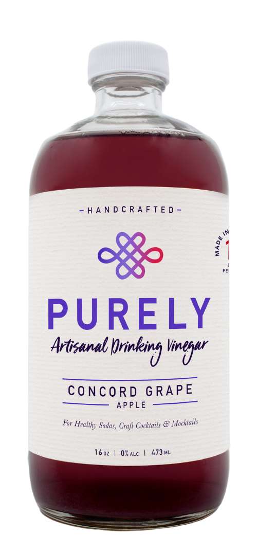 A 16oz bottle of Concord Grape Apple Infusion showcasing vibrant grape and apple colors, emphasizing its organic ingredients.