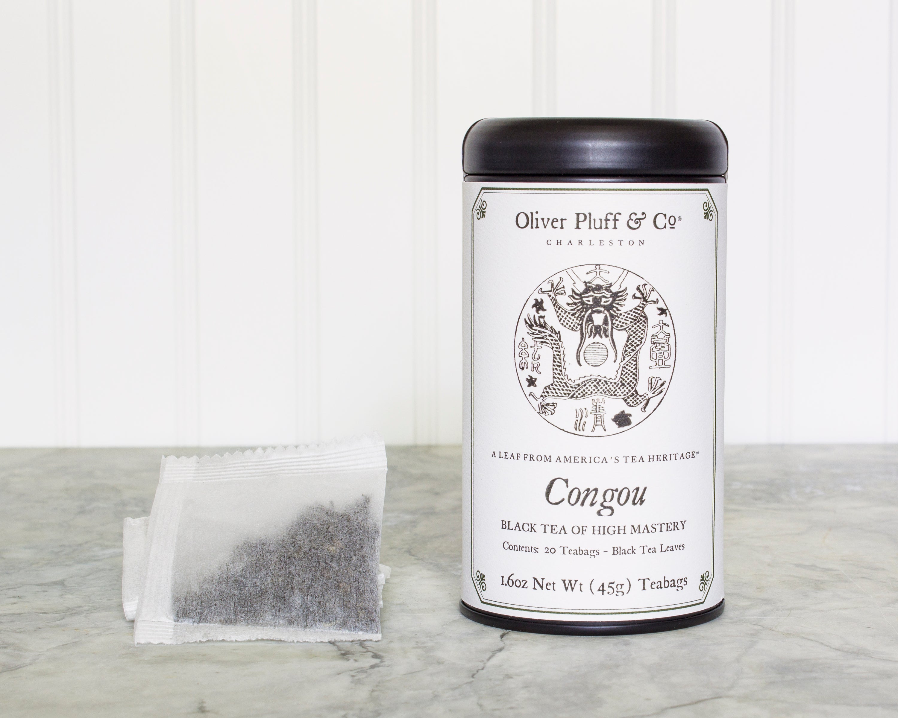 Congou Teabags in a stylish matte black tea tin, showcasing 20 premium teabags with a rich heritage.