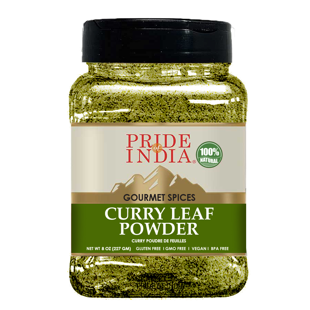 A 7 oz jar of Curry Leaf Powder showcasing its fine texture and rich green color, perfect for enhancing various dishes.