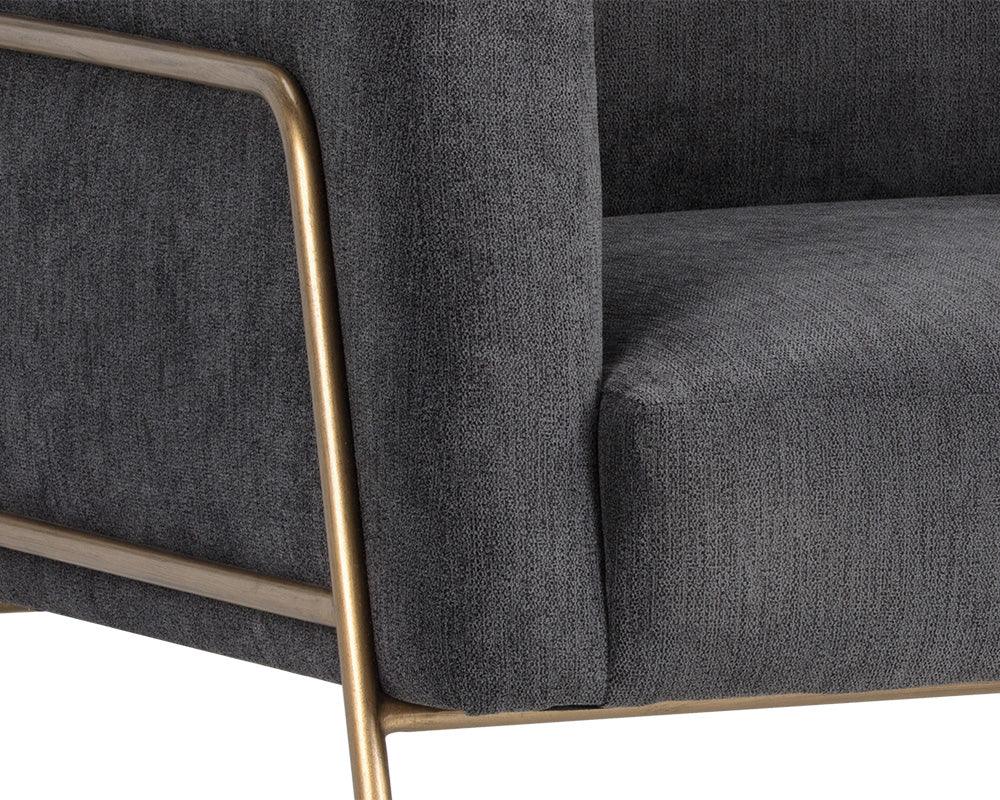 Cybil Lounge Chair in Polo Club Kohl Grey with antique brass legs, showcasing modern design and comfortable seating.