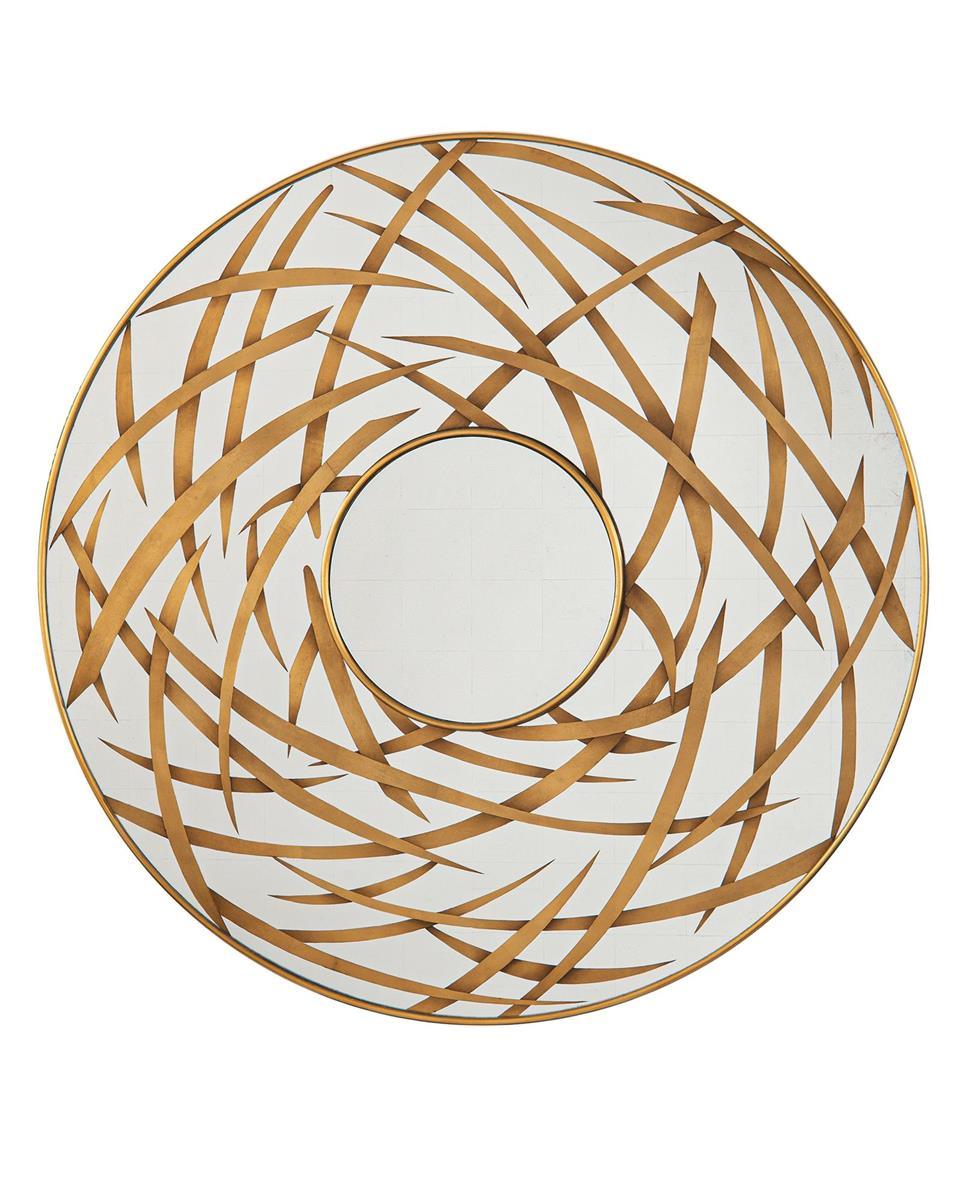 Dimitra Mirror featuring a round design with gold leaf reverse-painted finish and exotic gold frame accents.