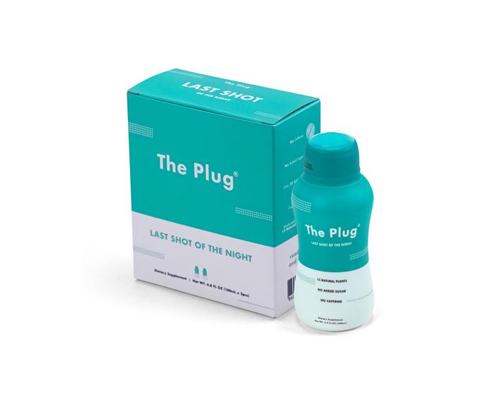 A refreshing bottle of The Plug Drink, showcasing its natural ingredients and pure bedrock water, perfect for hydration.