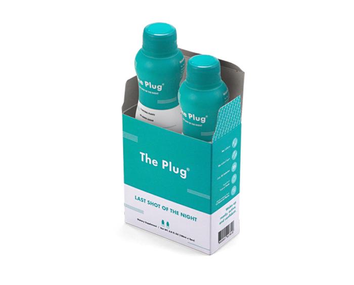 A refreshing bottle of The Plug Drink, showcasing its natural ingredients and pure bedrock water, perfect for hydration.