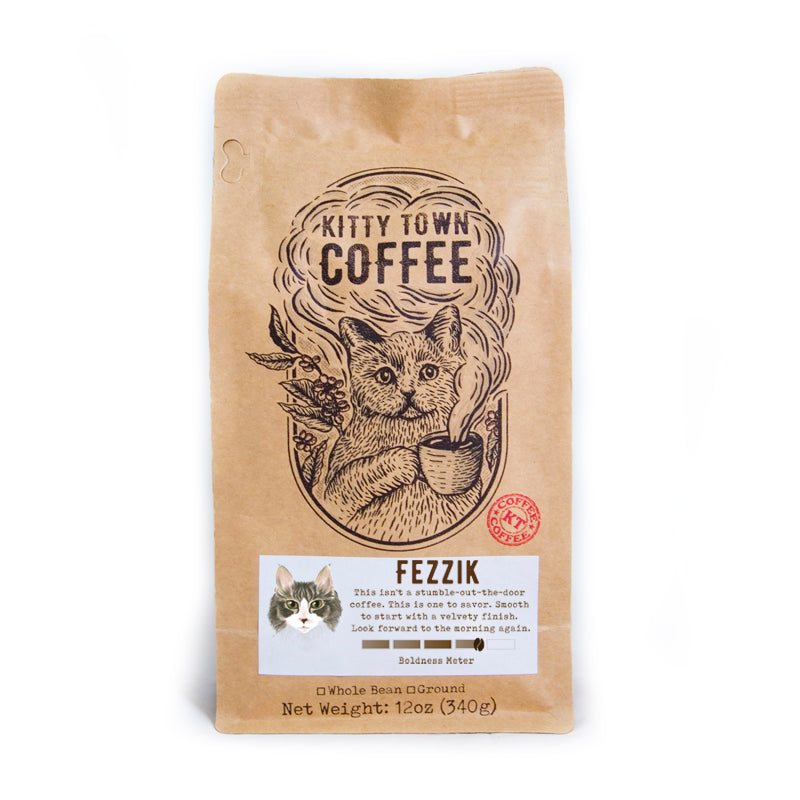 A bag of Fezzik Medium Roast coffee from Brazil, showcasing its rich, earthy design and hints of dark cocoa.