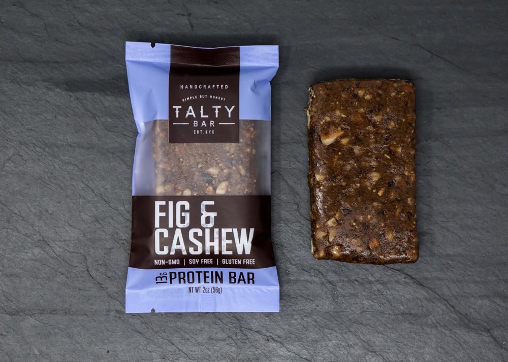 A Fig & Cashew Box featuring a delicious blend of figs, cashews, and other wholesome ingredients, perfect for a nutritious snack.