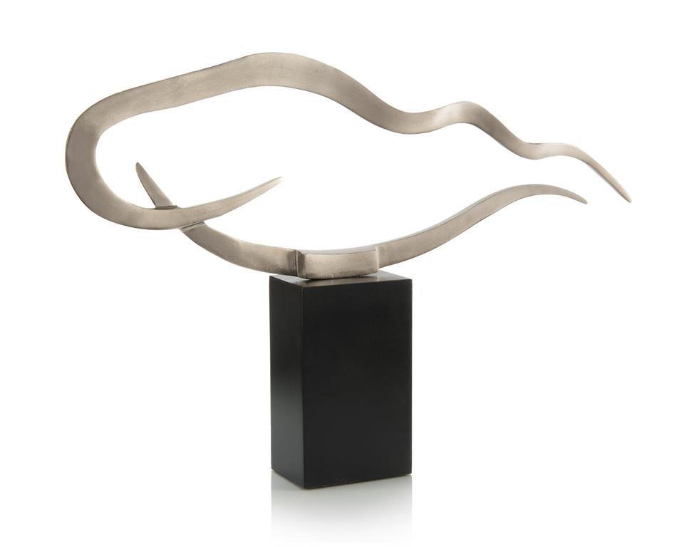 A polished nickel sculpture resembling a floating cloud, elegantly positioned over a sleek black base.