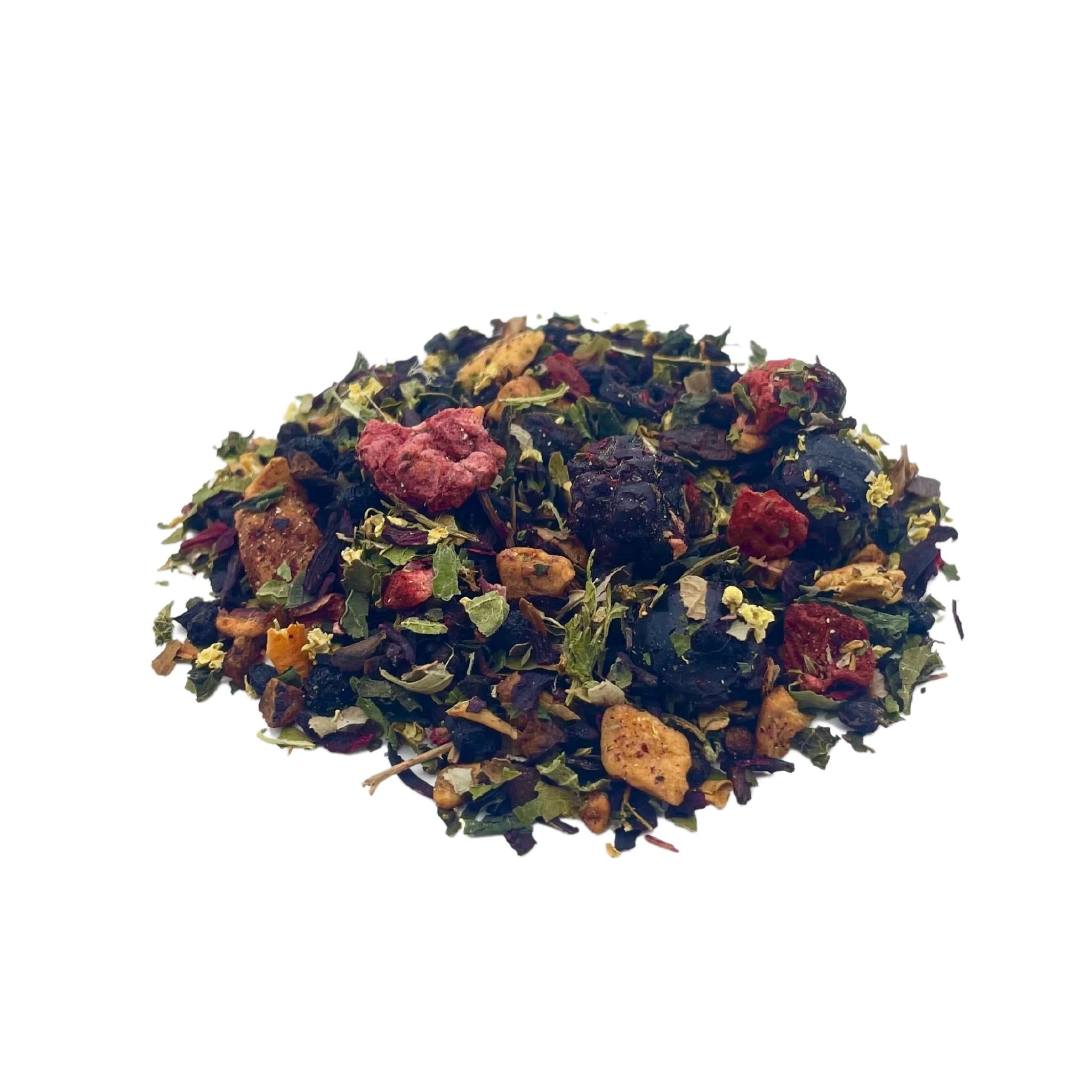 A vibrant blend of loose leaf tea featuring berries, fruits, and flowers, showcasing its colorful and natural ingredients.