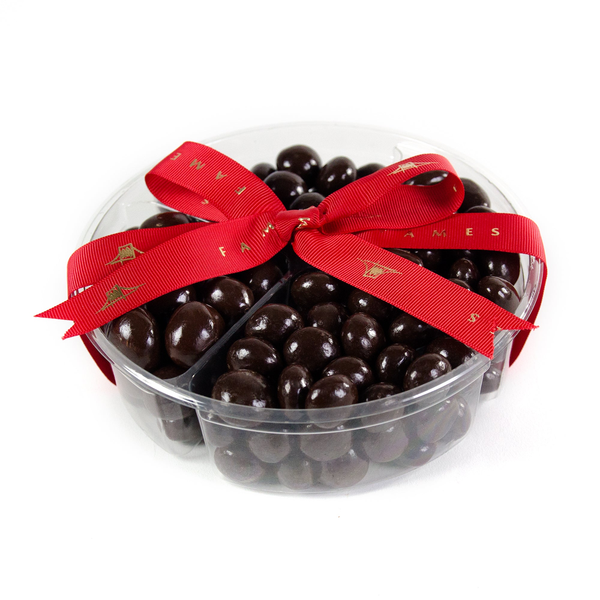 A beautifully arranged Four Sectional Chocolate Covered Mix featuring chocolate-covered almonds, truffle bits, and crispy chocolate bits in an elegant package.