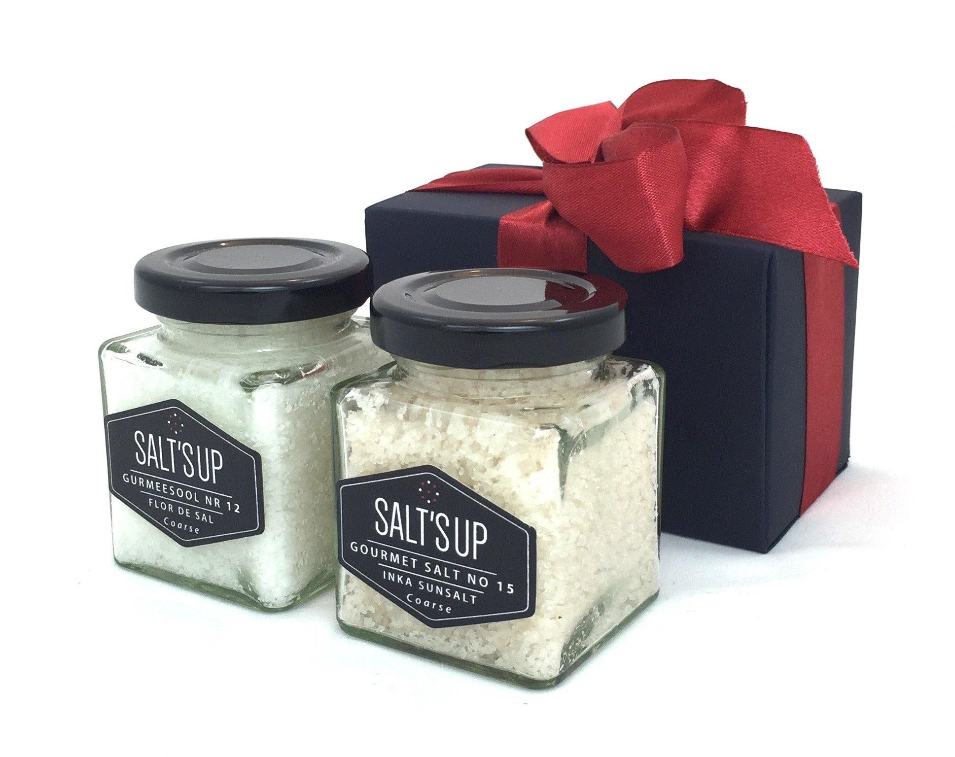 Gift box containing two jars of gourmet salt: Inka Sunsalt from Peru and Flor de Sal from Portugal, elegantly packaged.