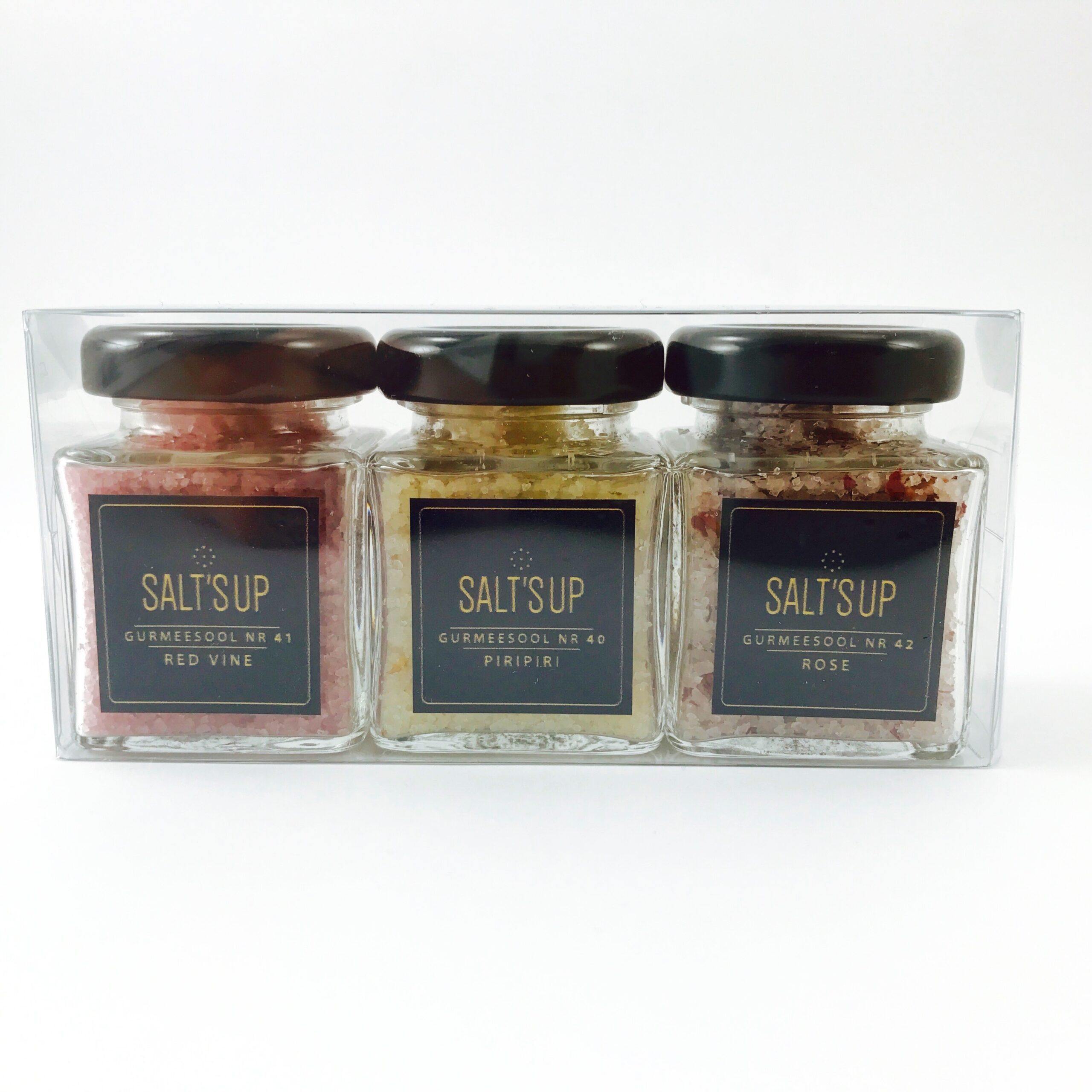 Gift box containing three jars of gourmet salt: PiriPiri, Red Wine, and Rose, elegantly packaged.