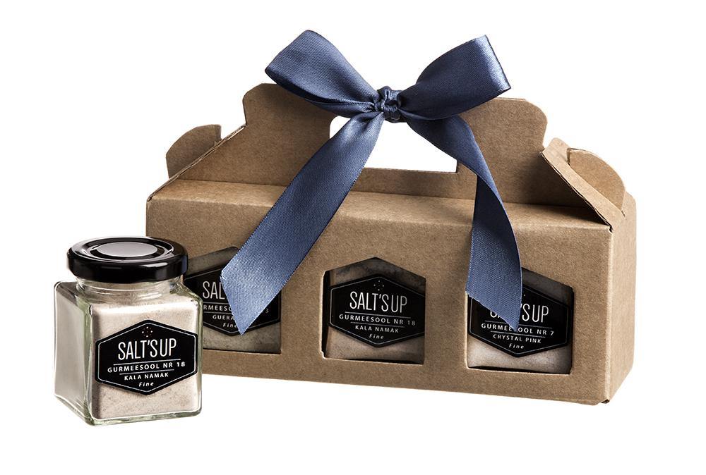 Gift box containing three gourmet salts: Himalayan Crystal Pink, Kala Namak, and Guerande fine salt, beautifully packaged.