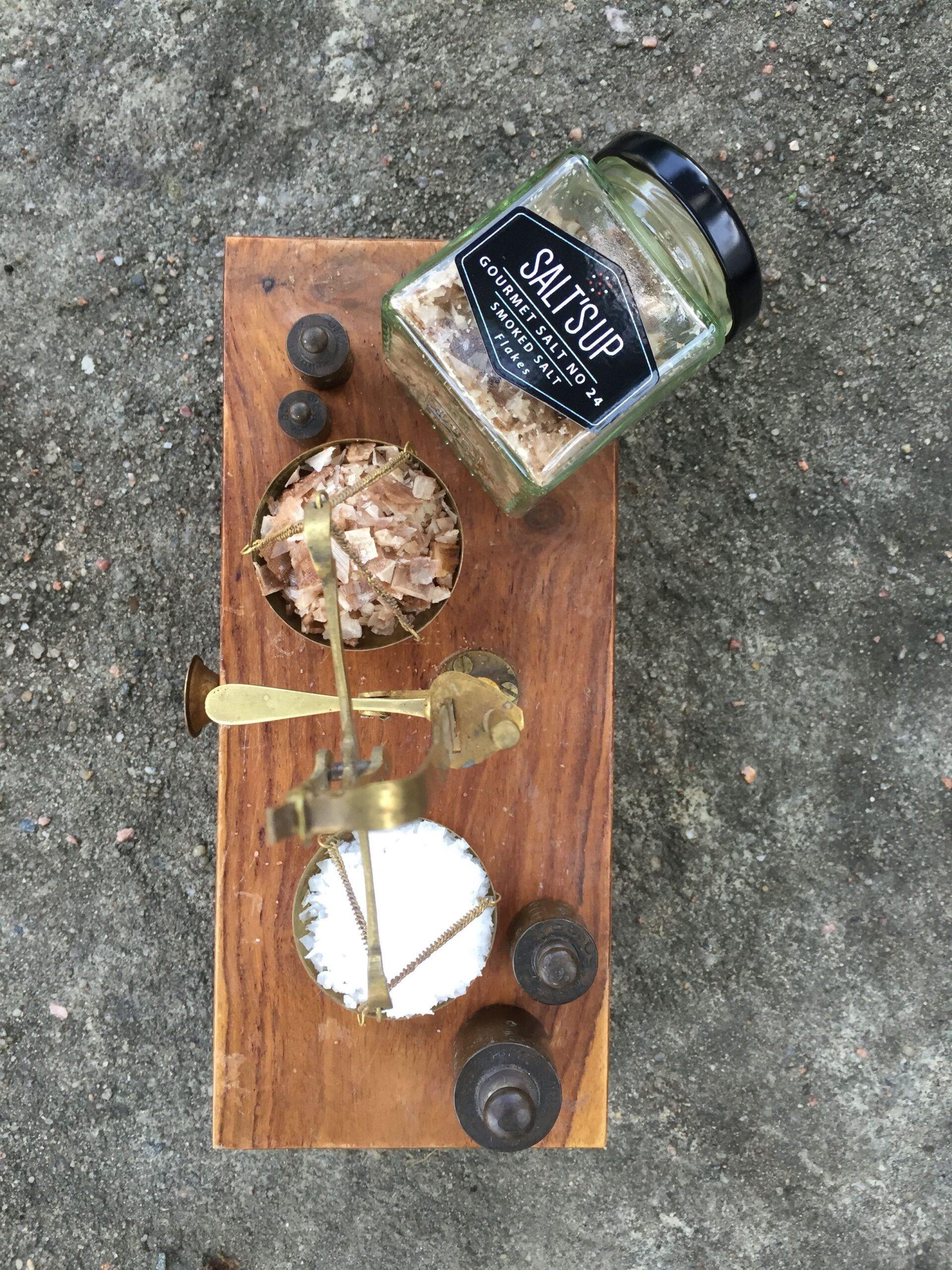 A beautifully arranged gift box containing three jars of gourmet salt flakes: Cyprus White, Smoked Salt, and Black Lava flakes, each with unique textures and flavors.