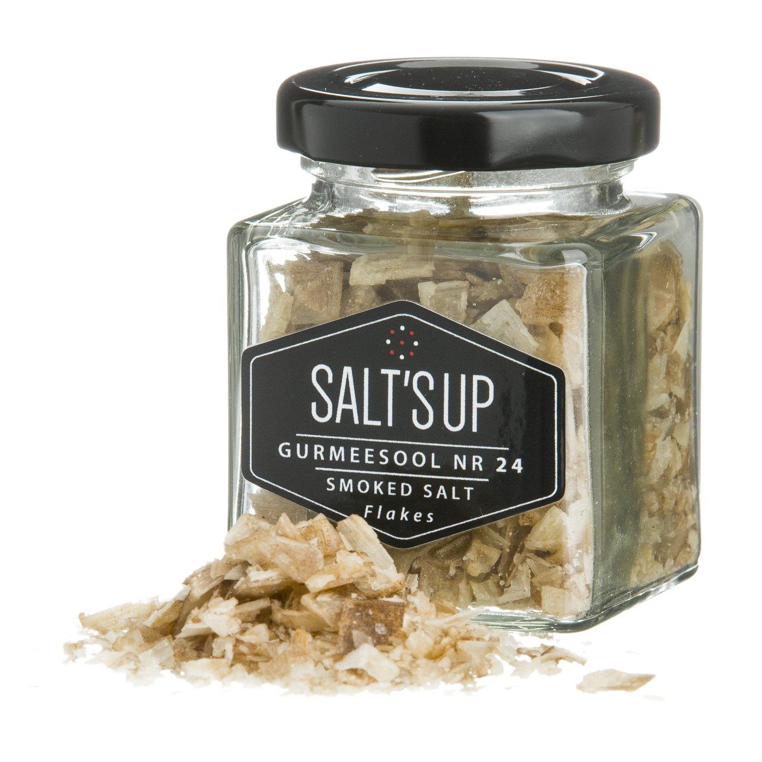 A beautifully arranged gift box containing three jars of gourmet salt flakes: Cyprus White, Smoked Salt, and Black Lava flakes, each with unique textures and flavors.