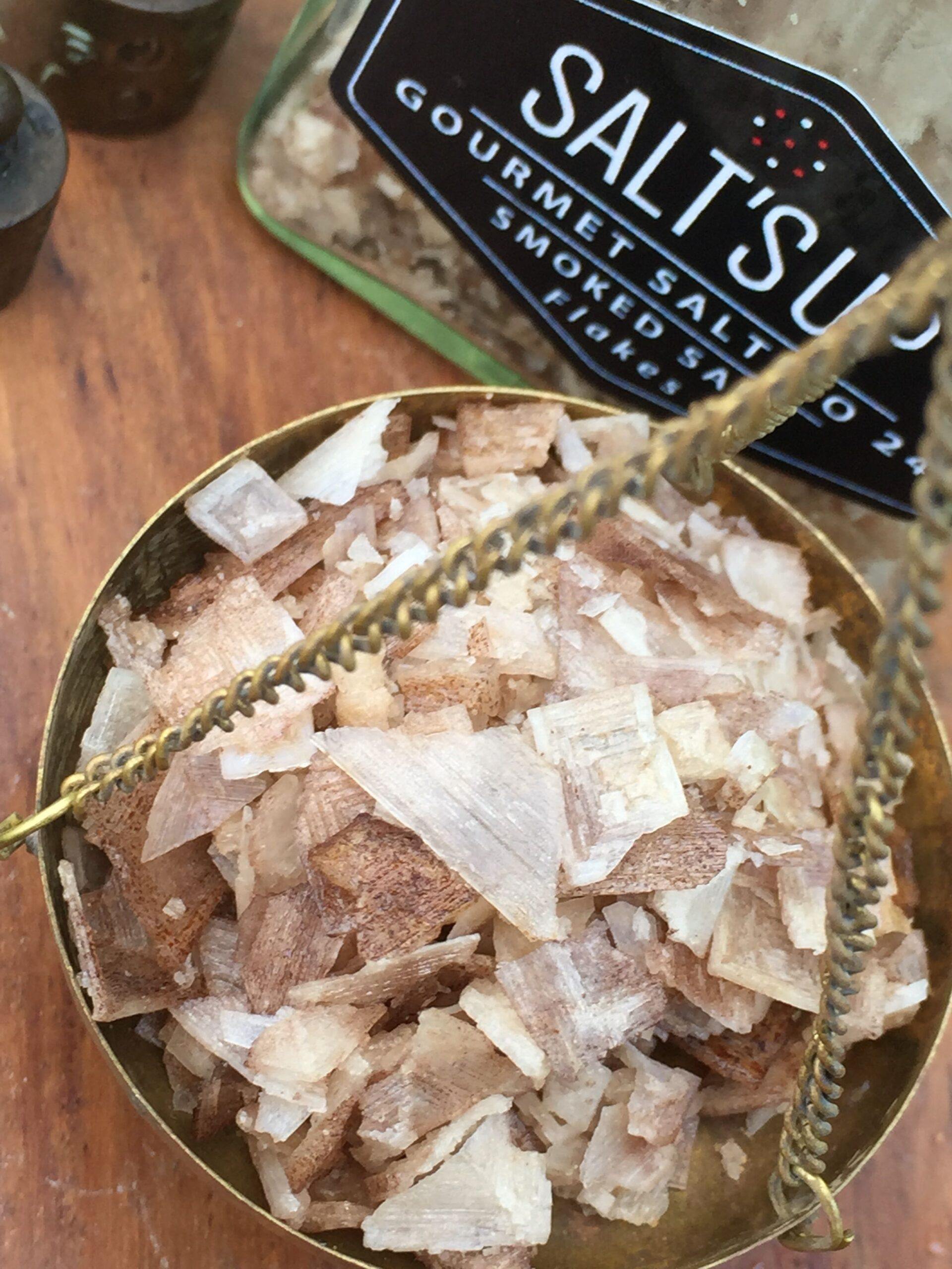 A beautifully arranged gift box containing three jars of gourmet salt flakes: Cyprus White, Smoked Salt, and Black Lava flakes, each with unique textures and flavors.