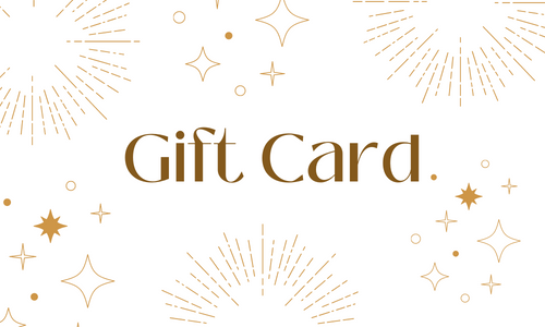 A colorful gift card displayed on a wooden table, symbolizing thoughtful gifting.