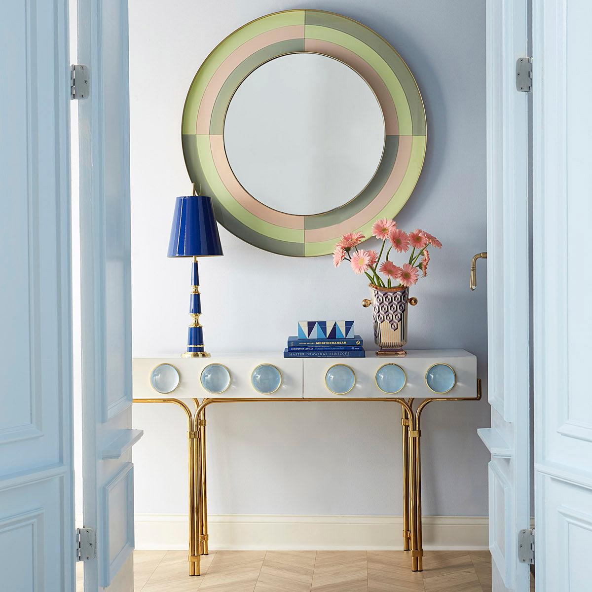 Globo Console featuring glossy white lacquer, brass framework, and blue acrylic cabochons.