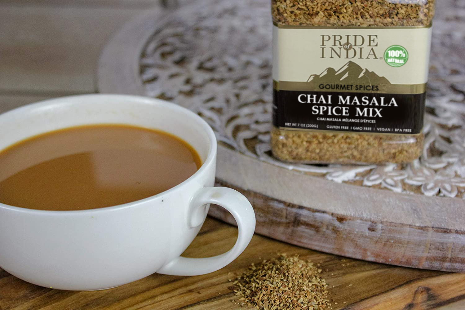 A jar of Gourmet Chai Masala Mulling Tea Spice Mix showcasing its rich blend of spices, perfect for enhancing beverages.