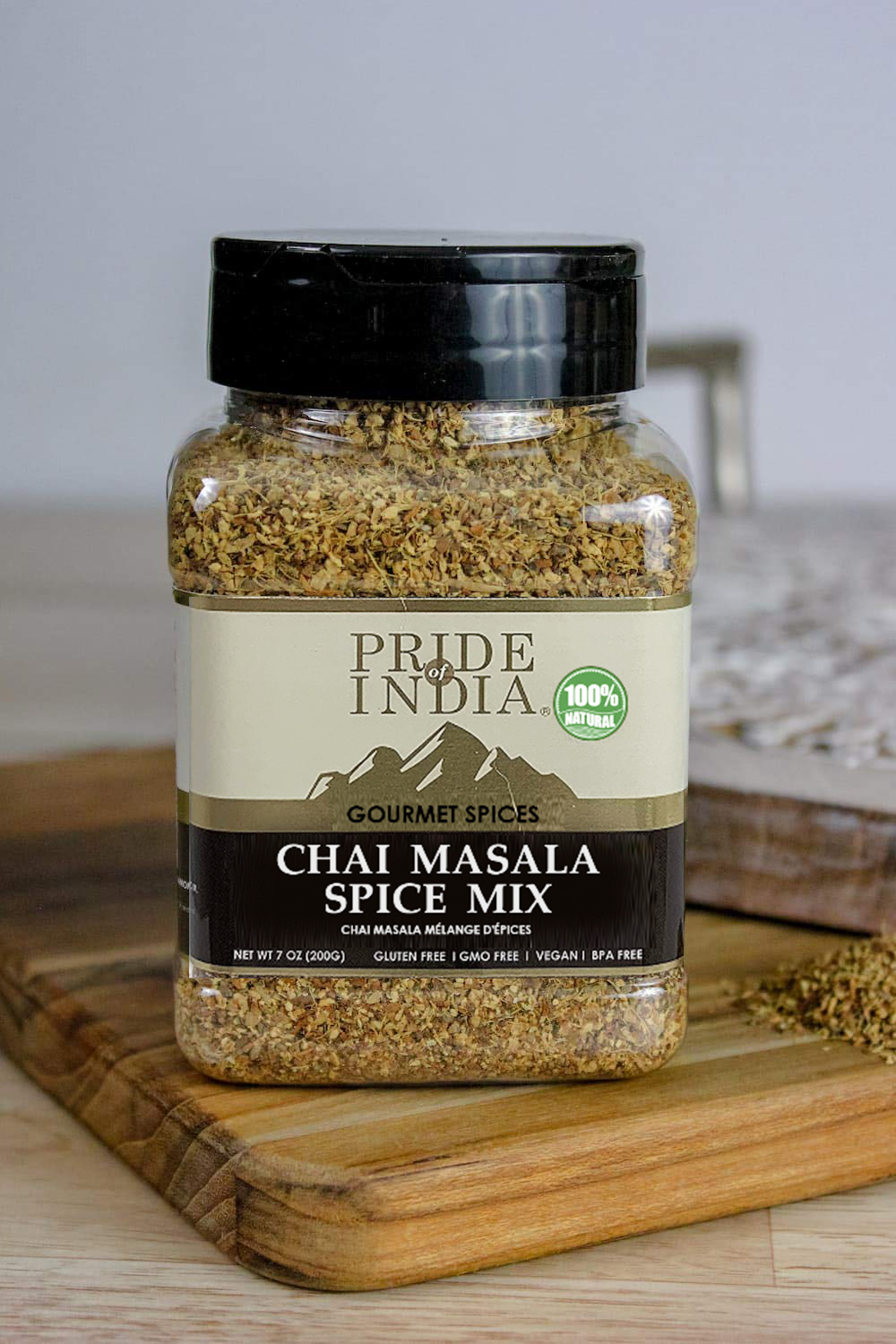 A jar of Gourmet Chai Masala Mulling Tea Spice Mix showcasing its rich blend of spices, perfect for enhancing beverages.