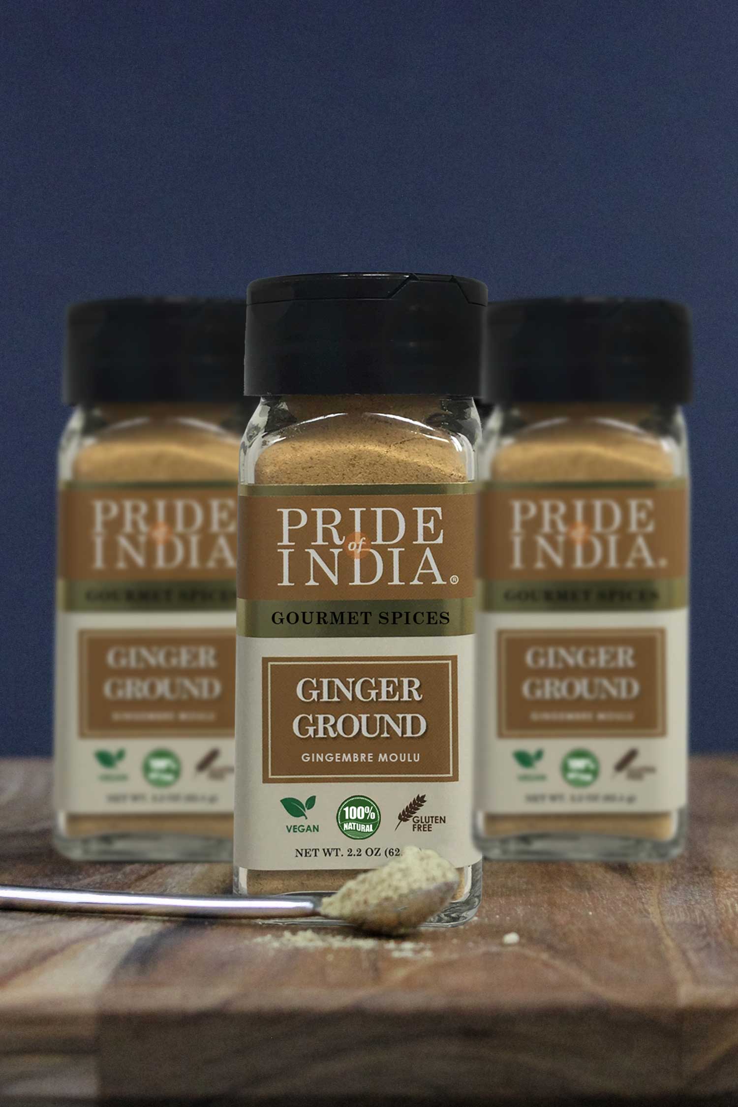 A jar of Pride of India Gourmet Ginger Fine Ground showcasing its fine texture and rich yellow color, perfect for enhancing dishes.