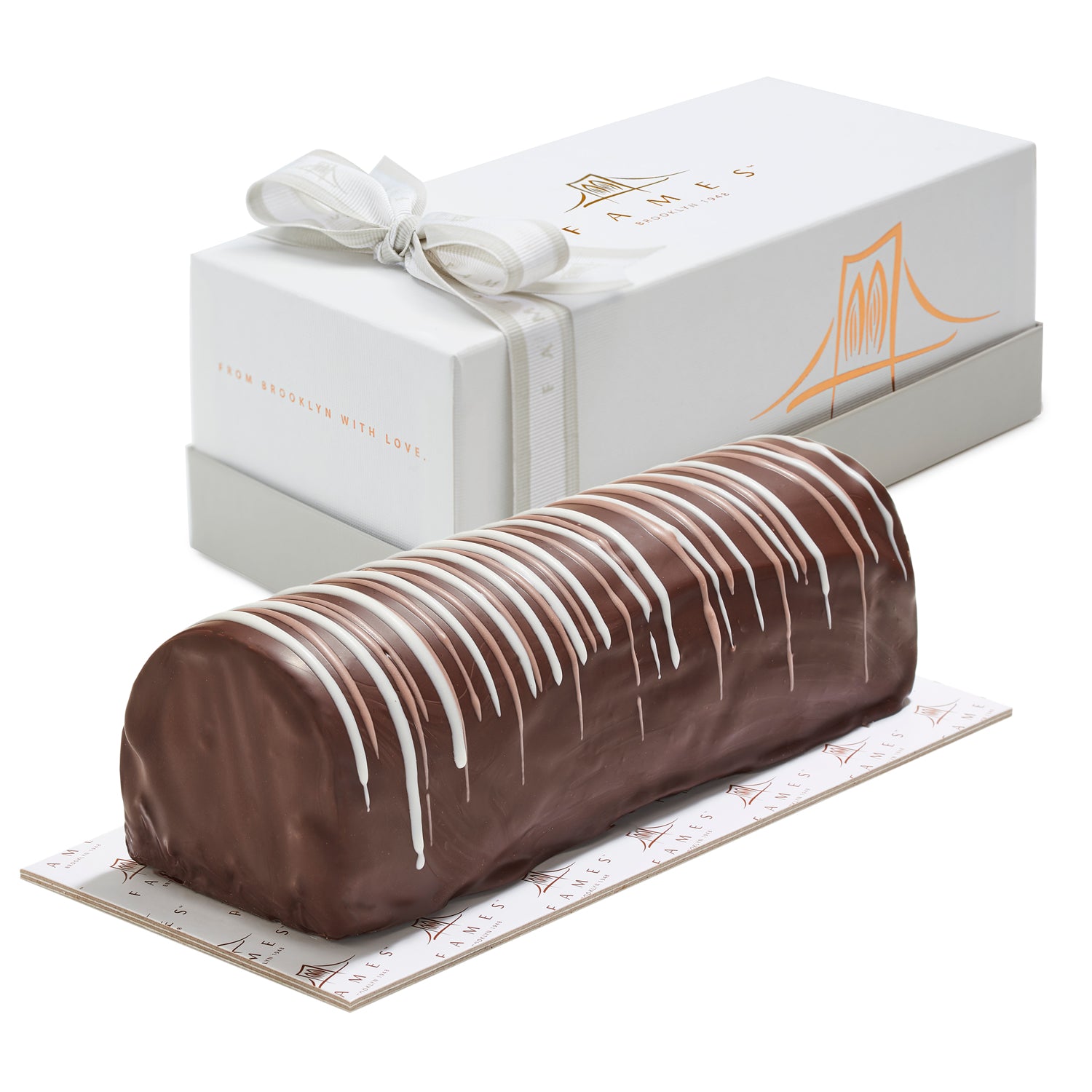 Gourmet Truffle Log In Gift Box featuring rich hazelnut ganache and dark chocolate coating, elegantly presented for gifting.