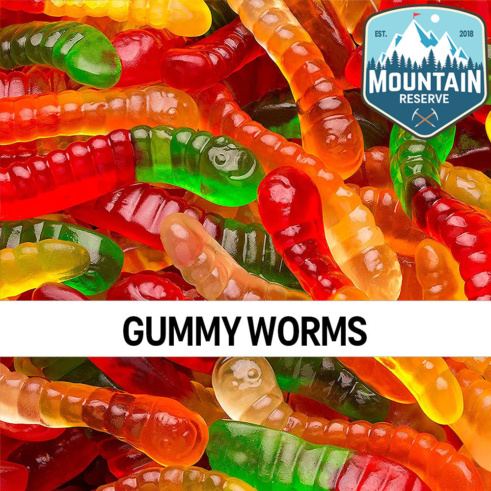 A colorful assortment of gummy worms in a clear container, showcasing their vibrant colors and chewy texture.