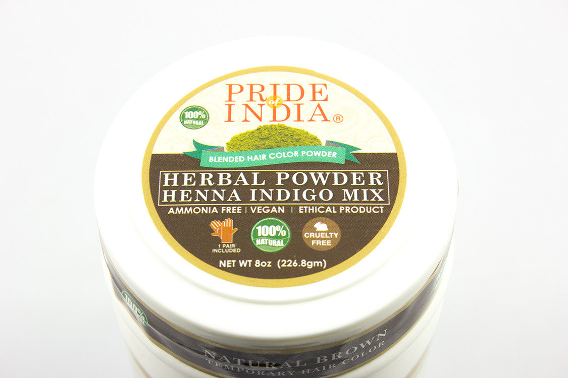 Hair Bloom Natural Brunette Hair Color powder in a jar with gloves, showcasing its herbal ingredients and natural brown color.