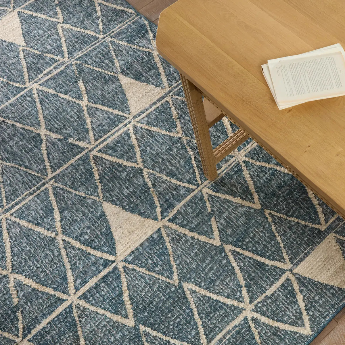 Helina rug featuring a navy and beige trellis pattern, handcrafted from jute and cotton, ideal for modern coastal decor.