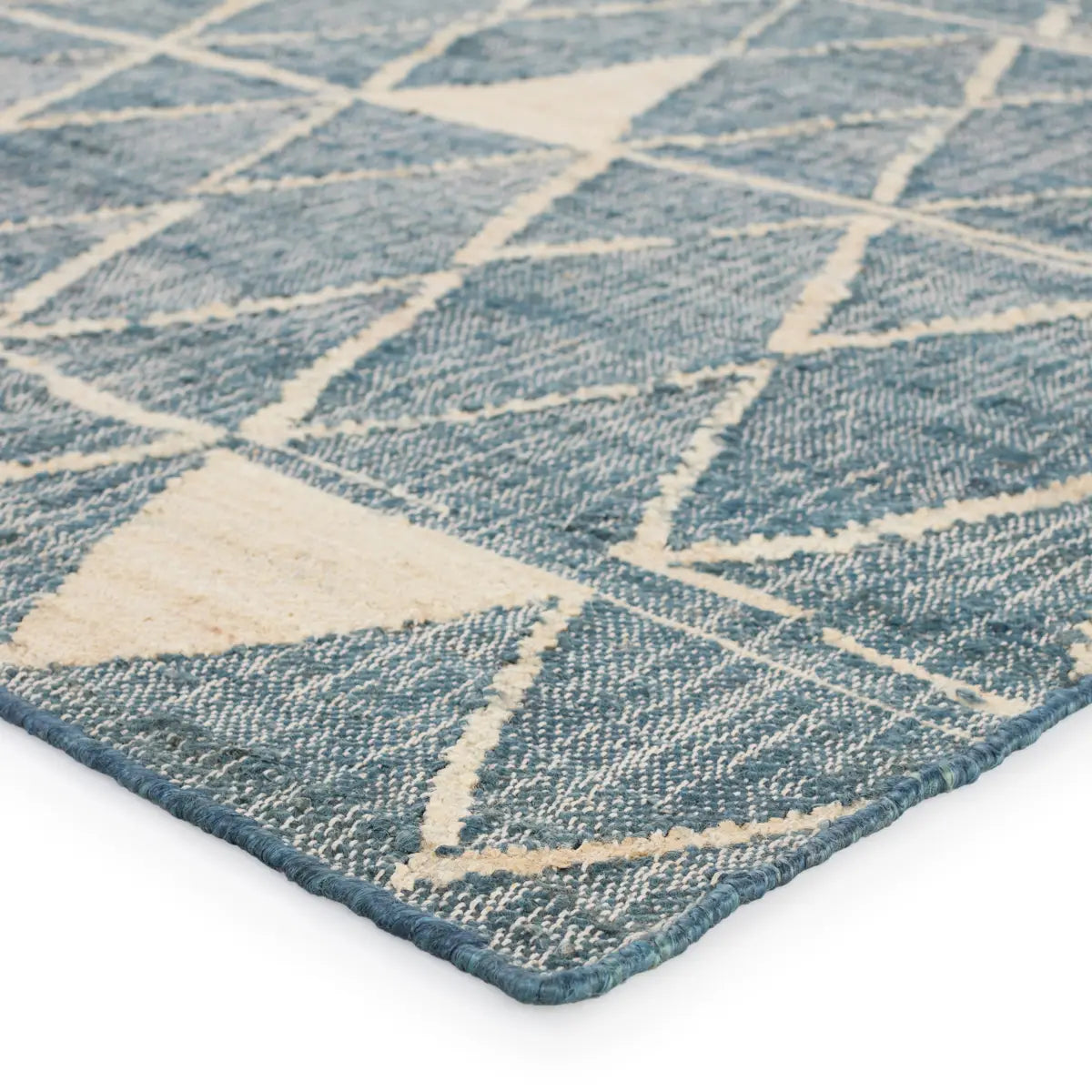 Helina rug featuring a navy and beige trellis pattern, handcrafted from jute and cotton, ideal for modern coastal decor.