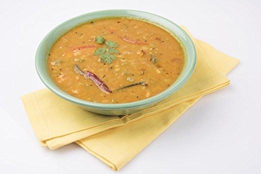 A bowl of Indian Panchratna Dal mixed with five types of lentils, showcasing its colorful and nutritious blend.