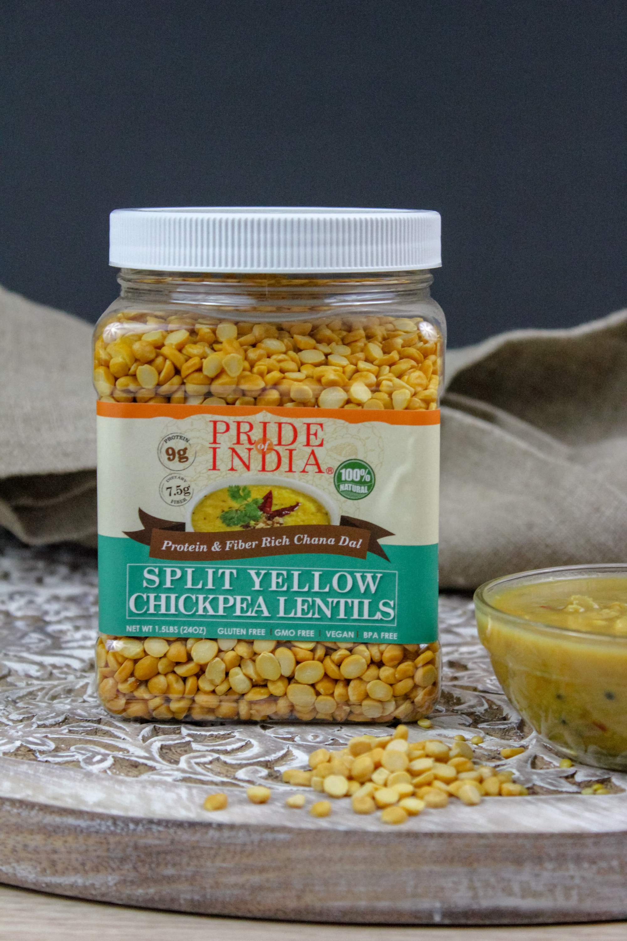 A jar of Indian Split Yellow Chickpea Lentils (Chana Dal) showcasing its natural color and texture, ideal for healthy cooking.