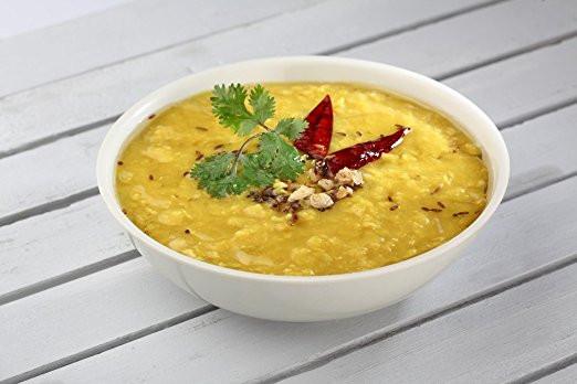 A jar of Indian Split Yellow Chickpea Lentils (Chana Dal) showcasing its natural color and texture, ideal for healthy cooking.