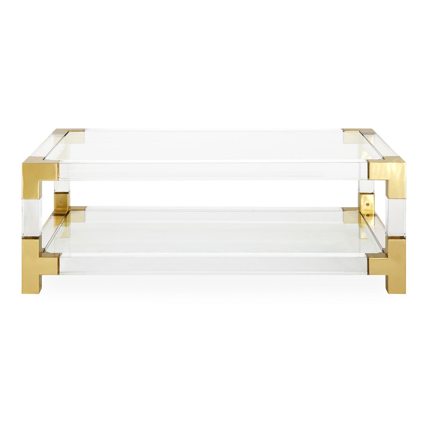 Jacques Grand Cocktail Table featuring clear acrylic and brushed brass accents, showcasing its elegant design and tempered glass shelf.