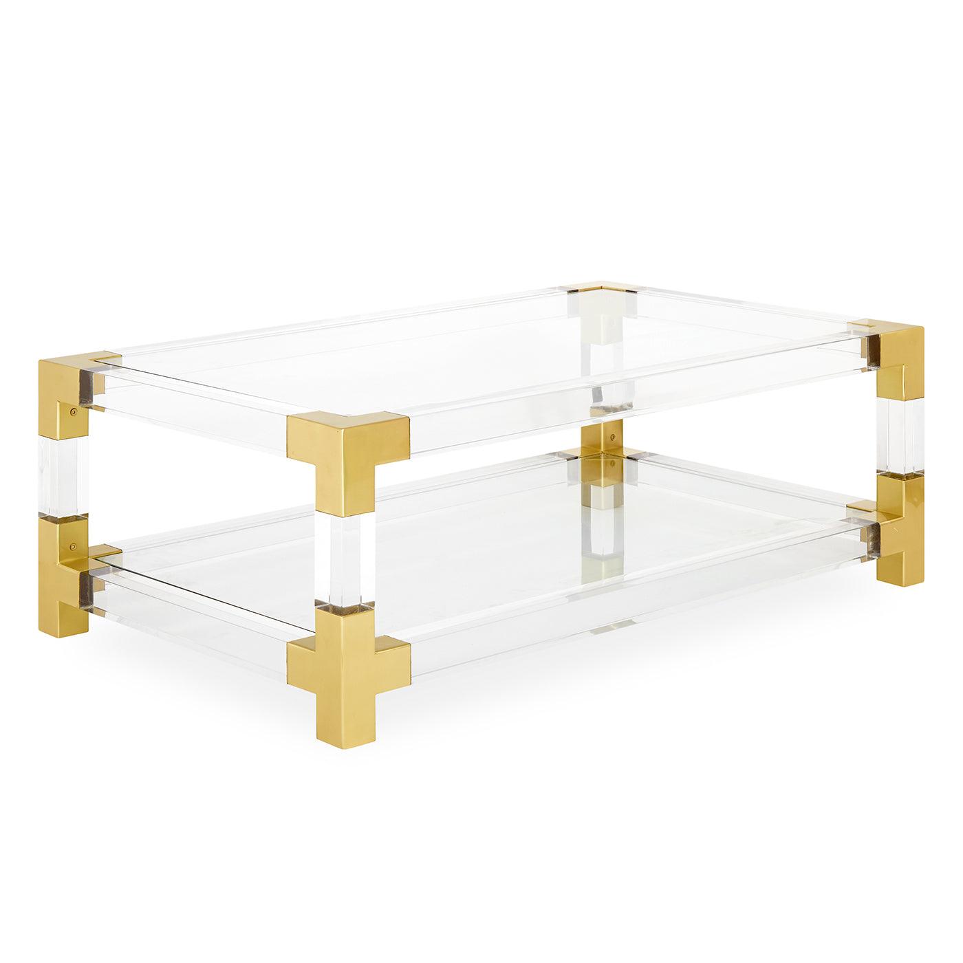 Jacques Grand Cocktail Table featuring clear acrylic and brushed brass accents, showcasing its elegant design and tempered glass shelf.