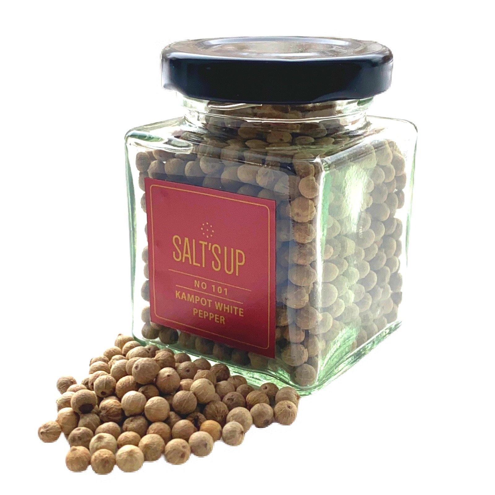 A jar of KAMPOT WHITE pepper showcasing its fine white-beige grains, symbolizing premium quality from Cambodia.