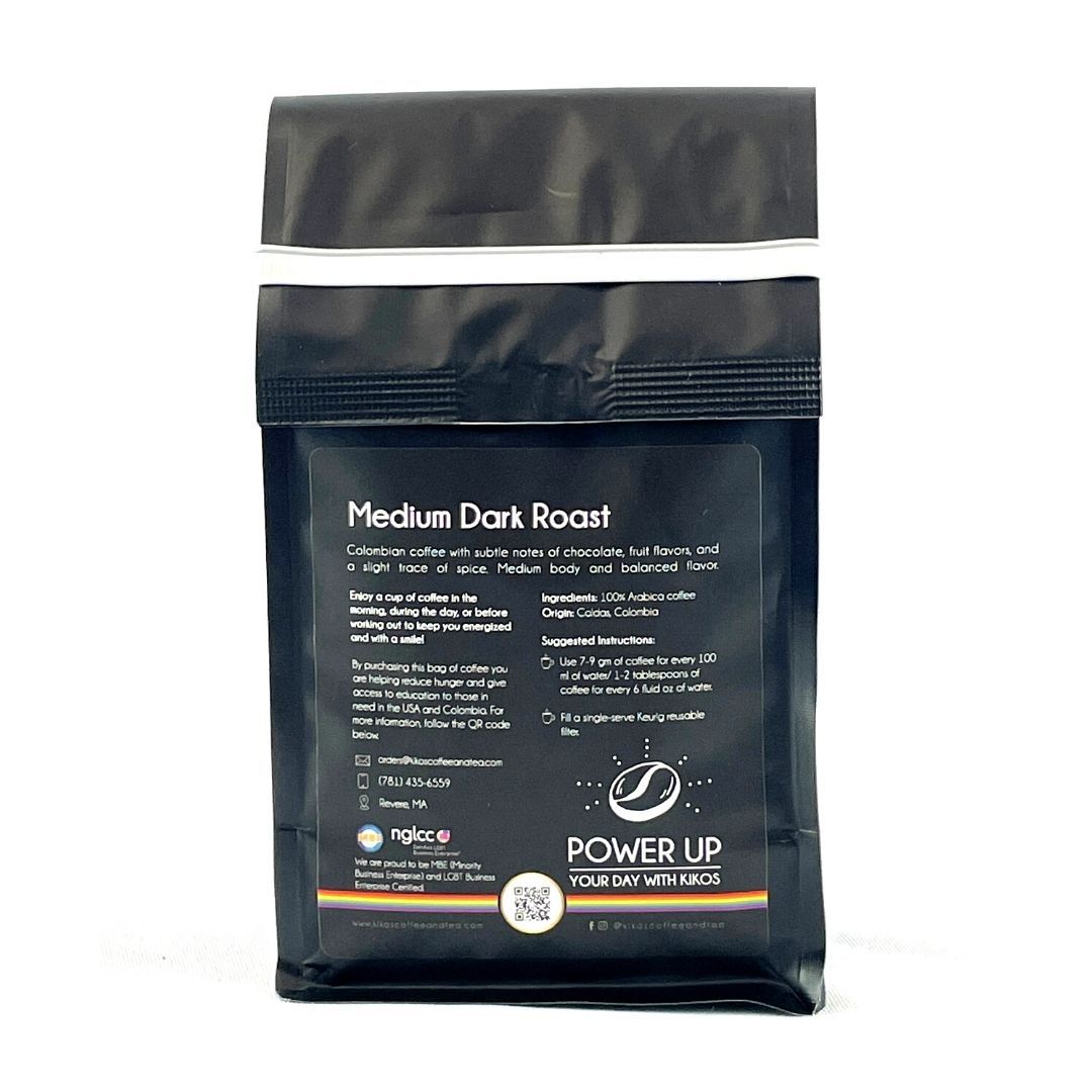 A bag of Kikos Colombian Coffee featuring 100% Colombian Arabica beans, showcasing its rich chocolate and fruit flavor profile.