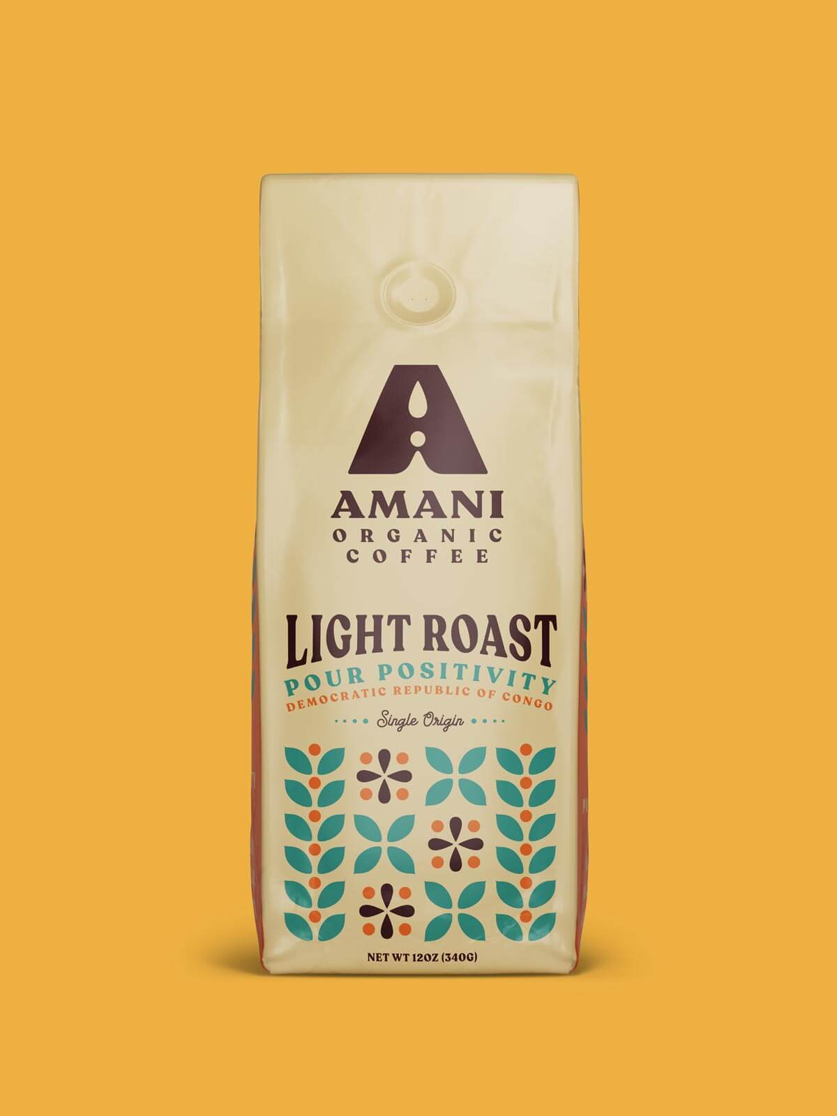 Amani Light Roast Single Origin Organic Coffee beans showcasing their bright and clean appearance, ideal for brewing a refreshing cup.