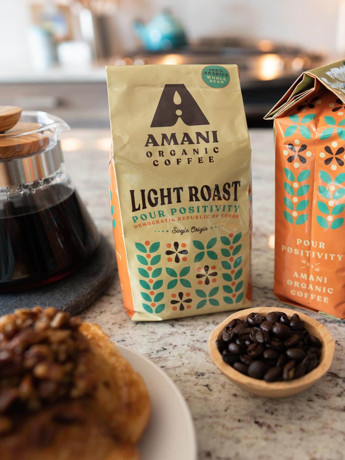 Amani Light Roast Single Origin Organic Coffee beans showcasing their bright and clean appearance, ideal for brewing a refreshing cup.