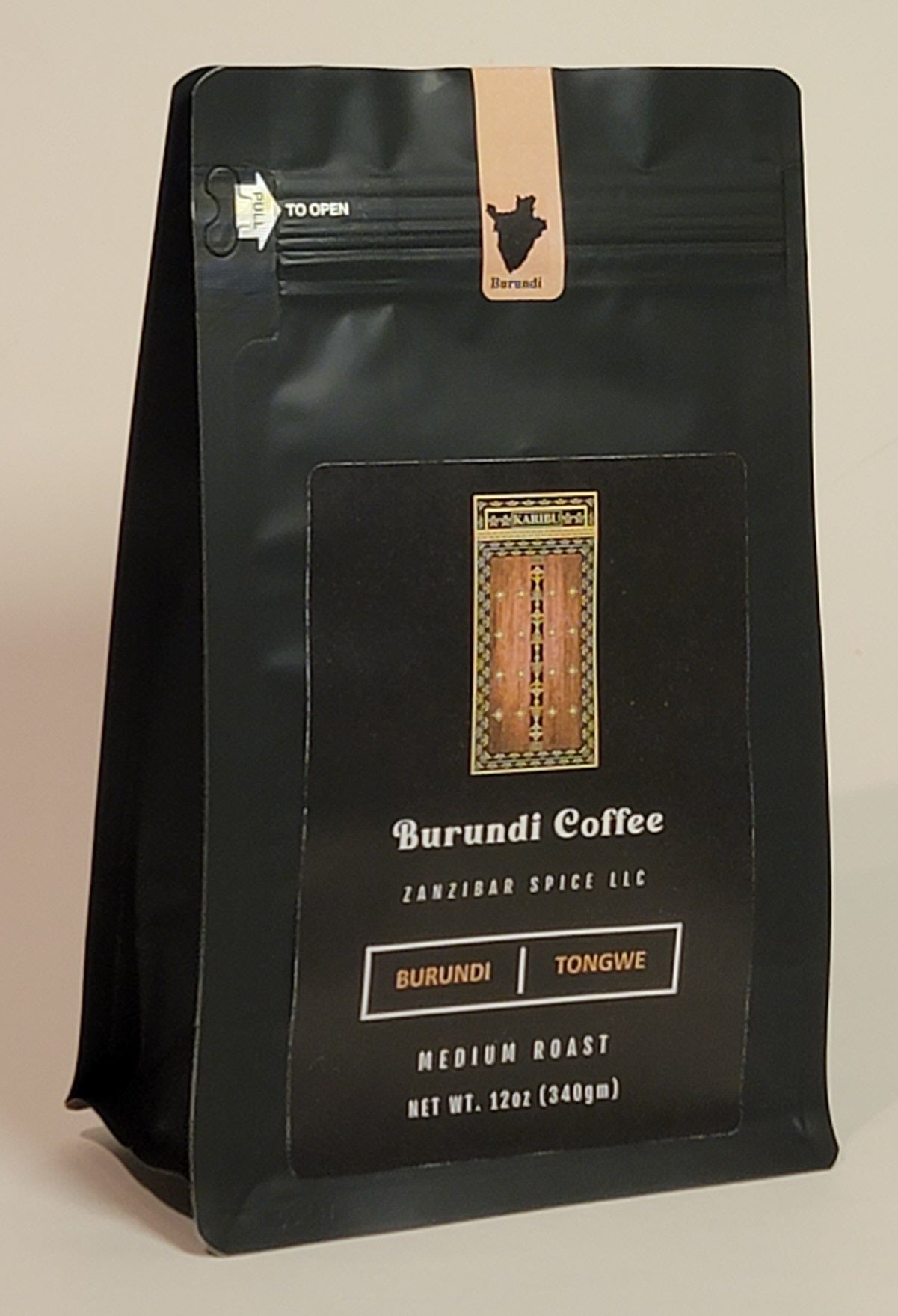 A 12oz resealable bag of Medium Roast Burundi Plain Coffee showcasing its rich brown color and aromatic appeal.