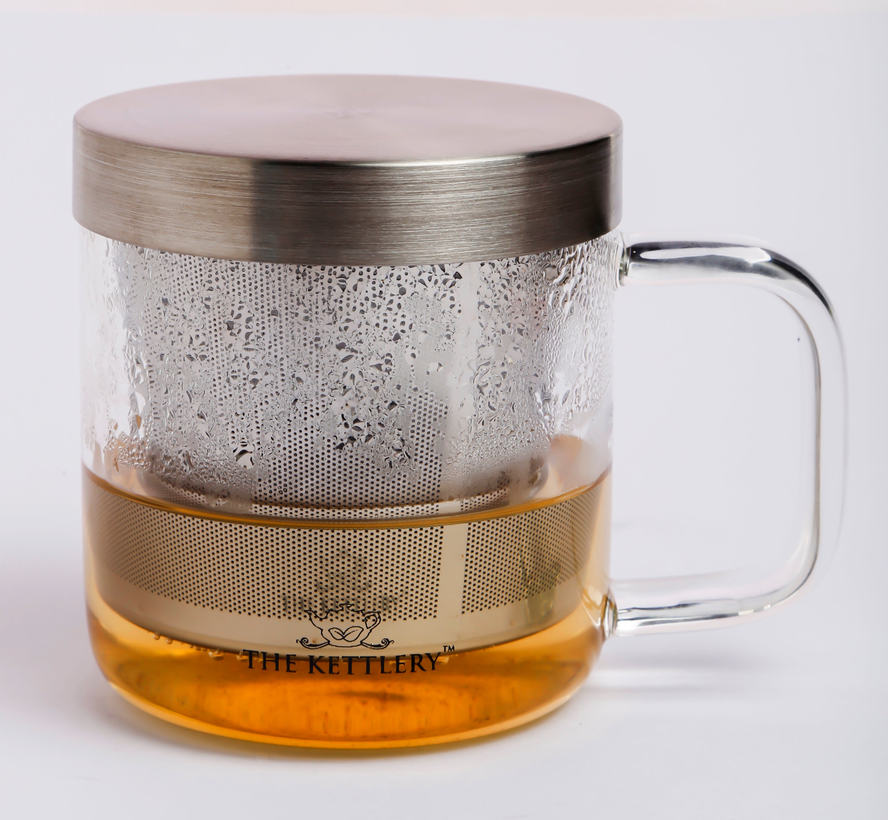 Milano Glass Tea Cup with stainless steel infuser and lid, elegantly designed for loose leaf tea brewing.