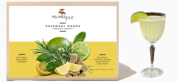 Mélange Jolie Rosemary Woods Cocktail SipKit™ with glass, bar spoon, and ingredients for cocktail making.