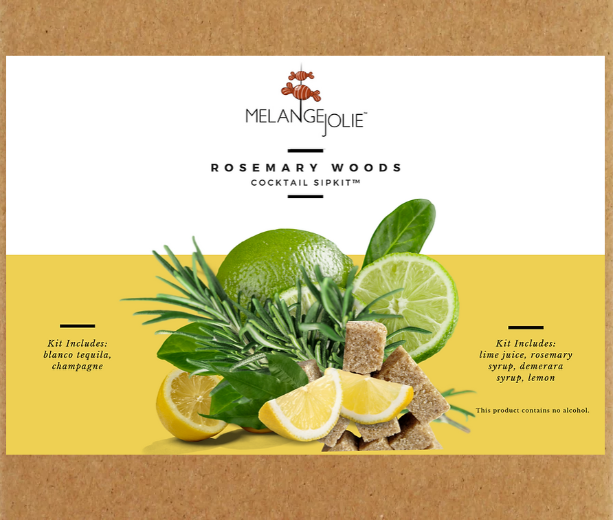 Mélange Jolie Rosemary Woods Cocktail SipKit™ with glass, bar spoon, and ingredients for cocktail making.