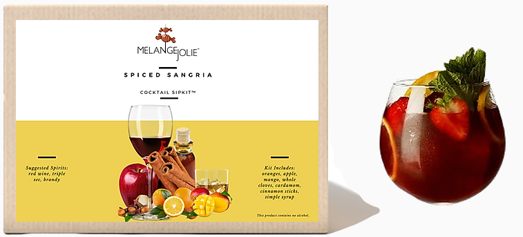 Mélange Jolie Spiced Sangria Cocktail SipKit™ with metal tumbler, dehydrated fruits, and spices displayed elegantly.