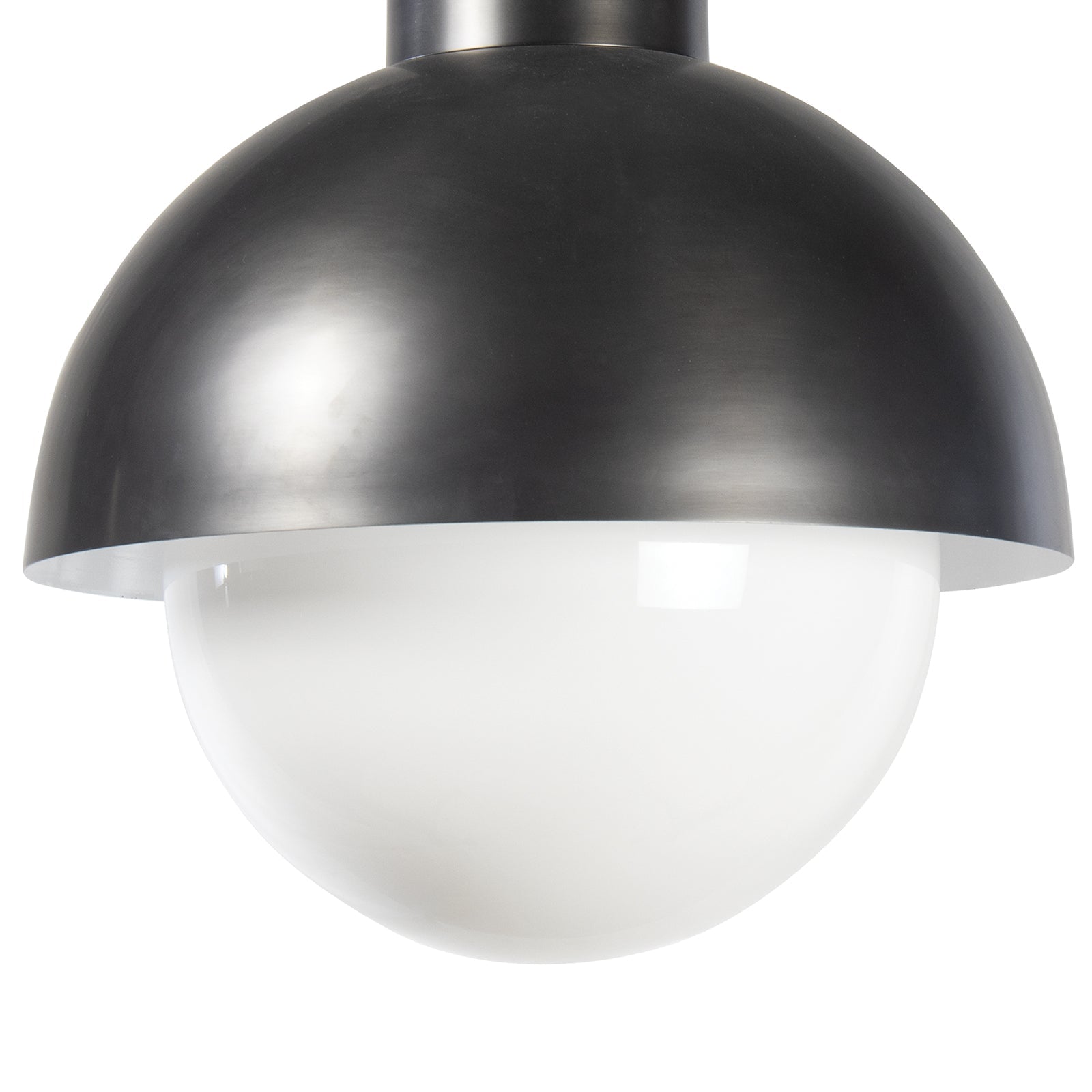 Montreux Pendant light featuring a curved metal shade and large milk glass globe, perfect for modern home decor.