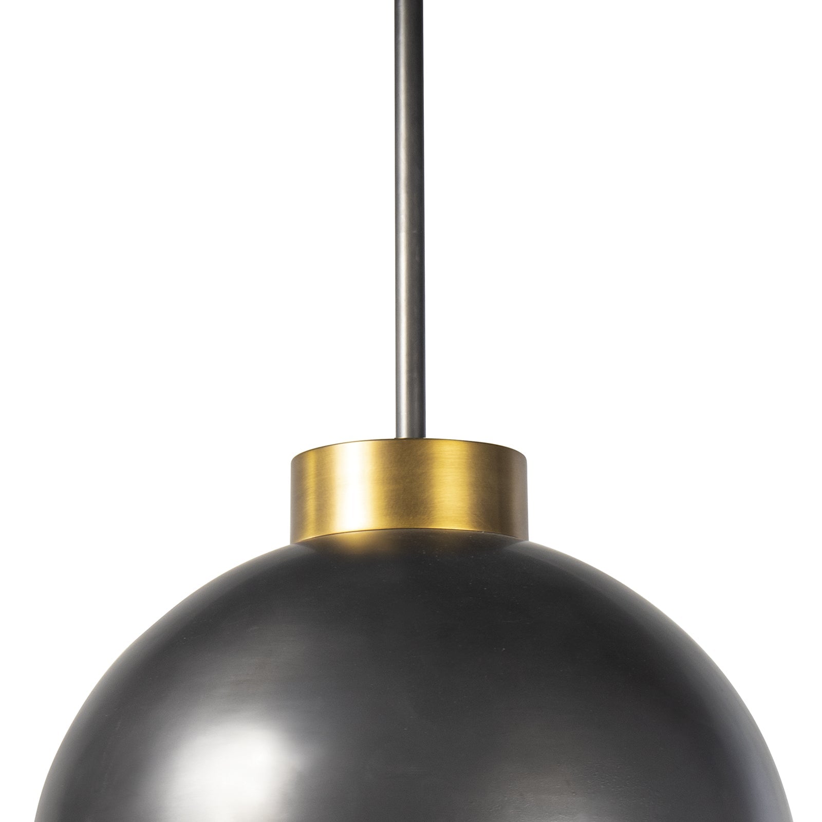 Montreux Pendant light featuring a curved metal shade and large milk glass globe, perfect for modern home decor.