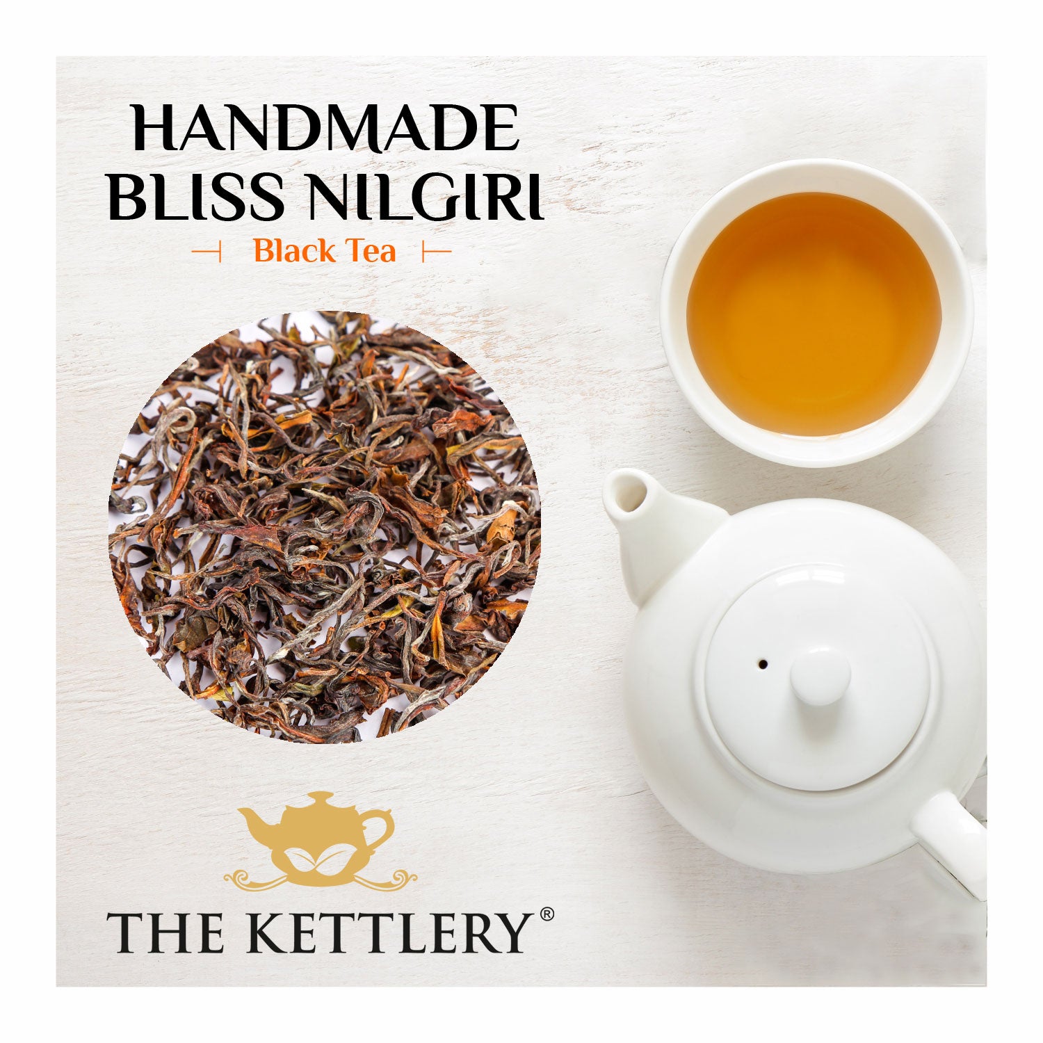 A beautifully twisted loose leaf of NEW Handmade Bliss Nilgiri Black Tea, showcasing its rich color and texture, set against a rustic background.